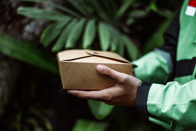 Man Delivering Box With Food