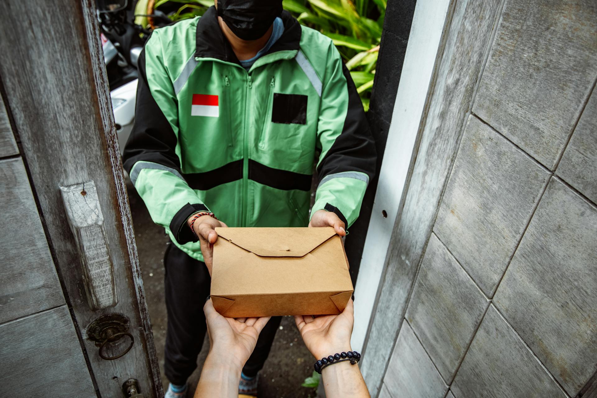 A Man Delivering a Package