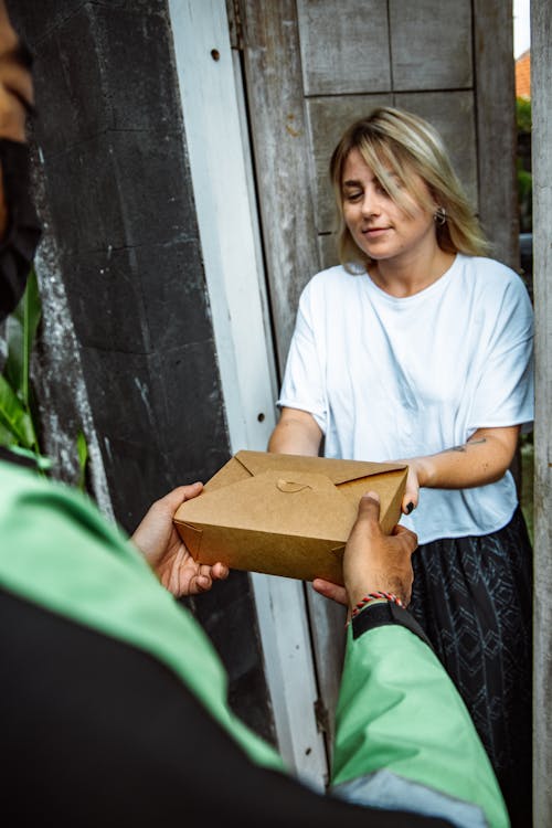 A Woman Receiving a Package