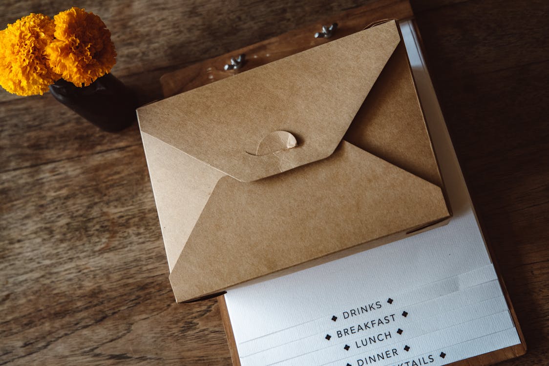 A Brown Envelope on a Wooden Table