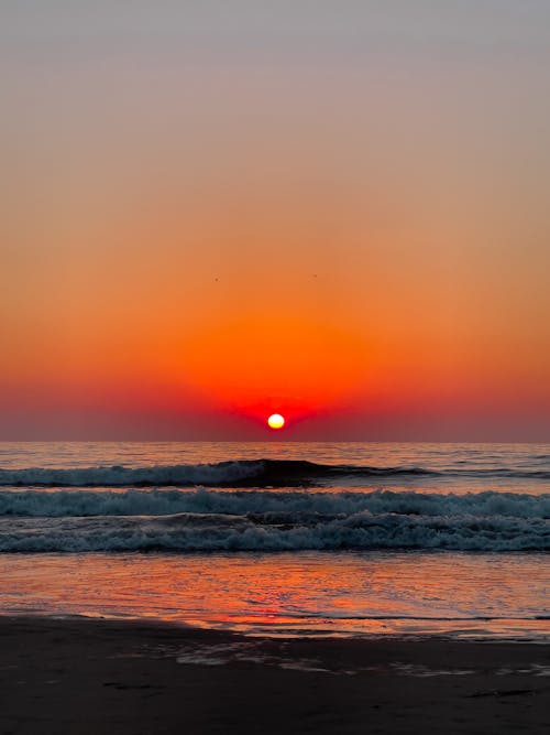 Free A Sunset at Sea Stock Photo