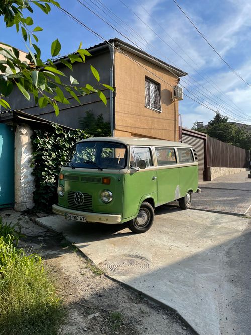 Free Green vintage Volkswagen van parked in a residential area in Odesa, Ukraine. Stock Photo