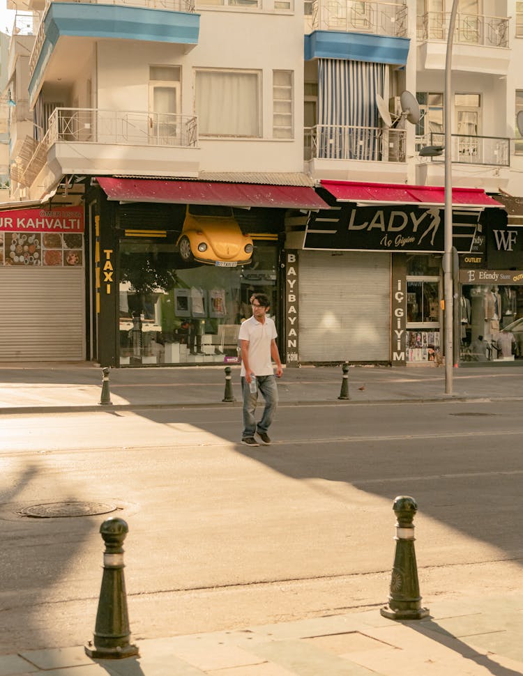 A Man Crossing The Street