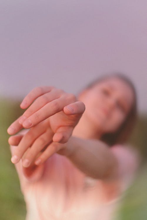 A Woman Stretching Her Hands