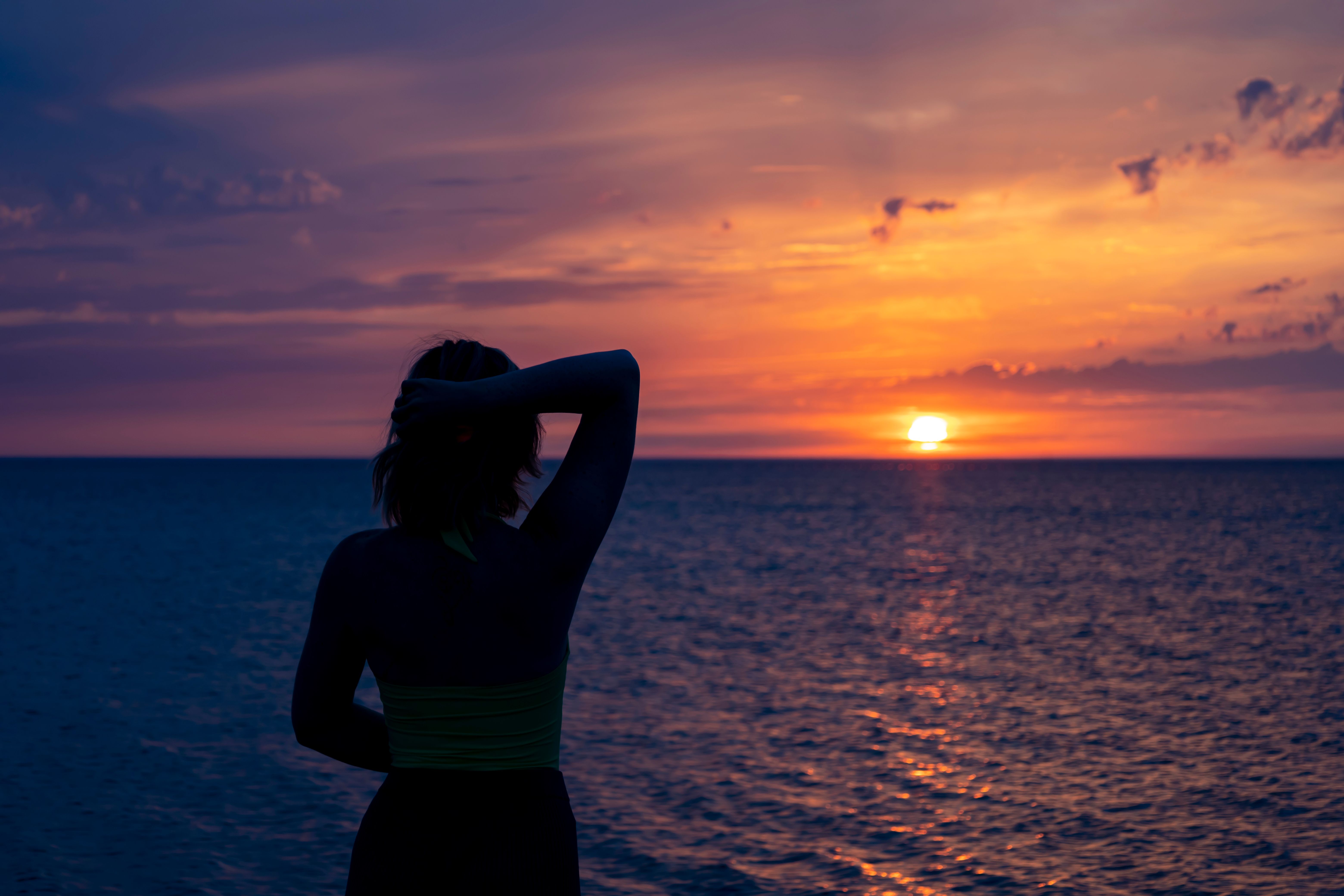 Woman Posing in Traditional Clothing on Sea Shore at Sunset · Free ...