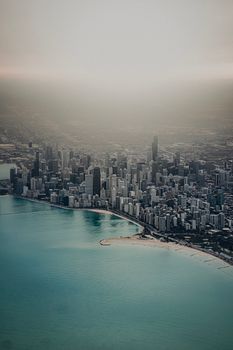 A breathtaking aerial view of downtown Chicago with Lake Michigan in the foreground.
