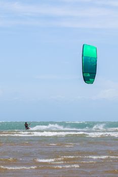 Exciting kiteboarding scene in Adicora, Venezuela, showcasing dynamic water sports action.