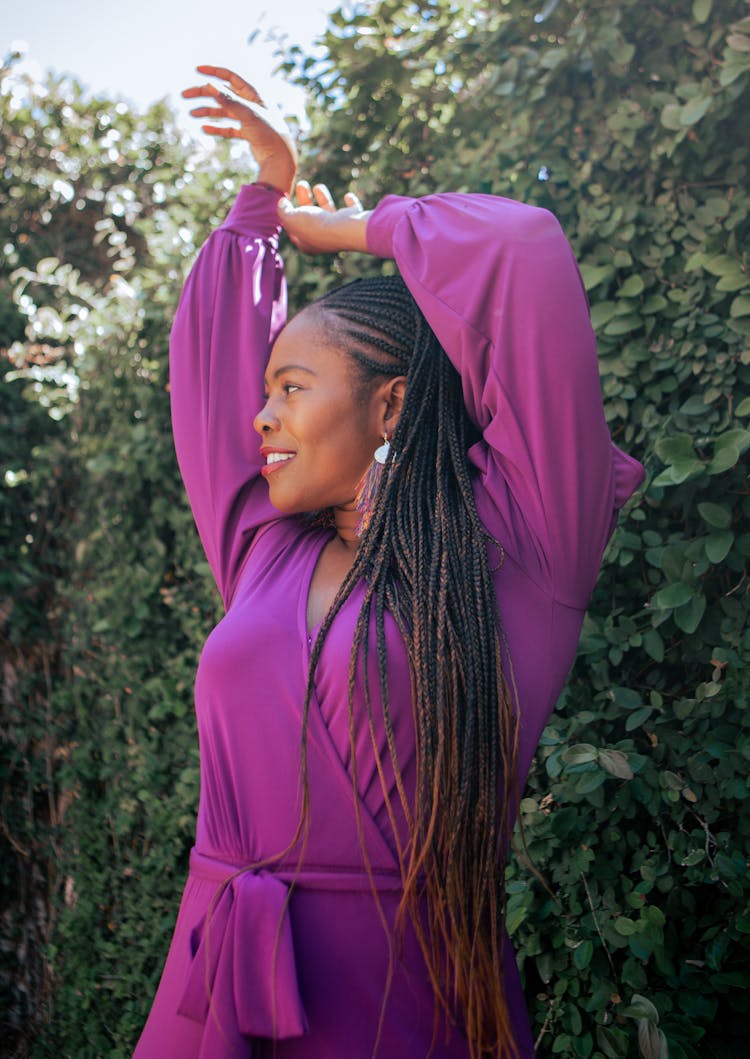 Smiling Woman In Purple Dress