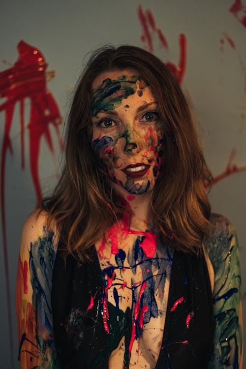 Woman With Paint on Face and Body
