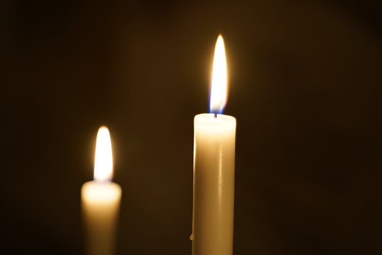 Close-Up Of Burning Candles 