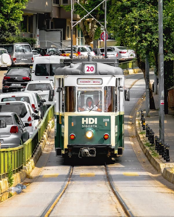 Tram and Cars in Traffic in City 