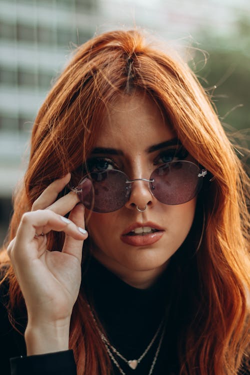 Redhead Woman with Sunglasses