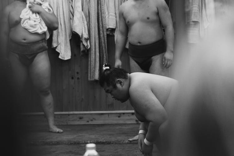 Black And White Photo Of Sumo Wrestler Before Fight