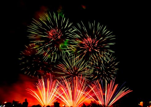 Stunning long-exposure of colorful fireworks lighting up the night sky.