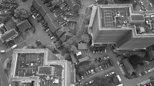 Grayscale Photo of City Buildings