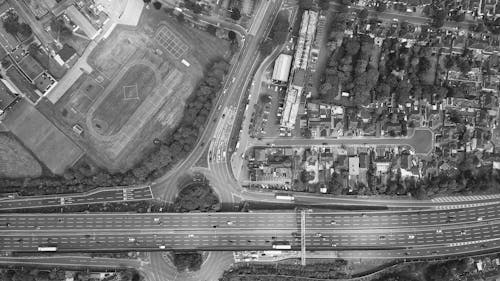 Grayscale Photo of City Buildings
