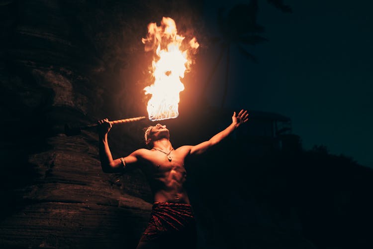 Portrait Of A Fire Eater At Night