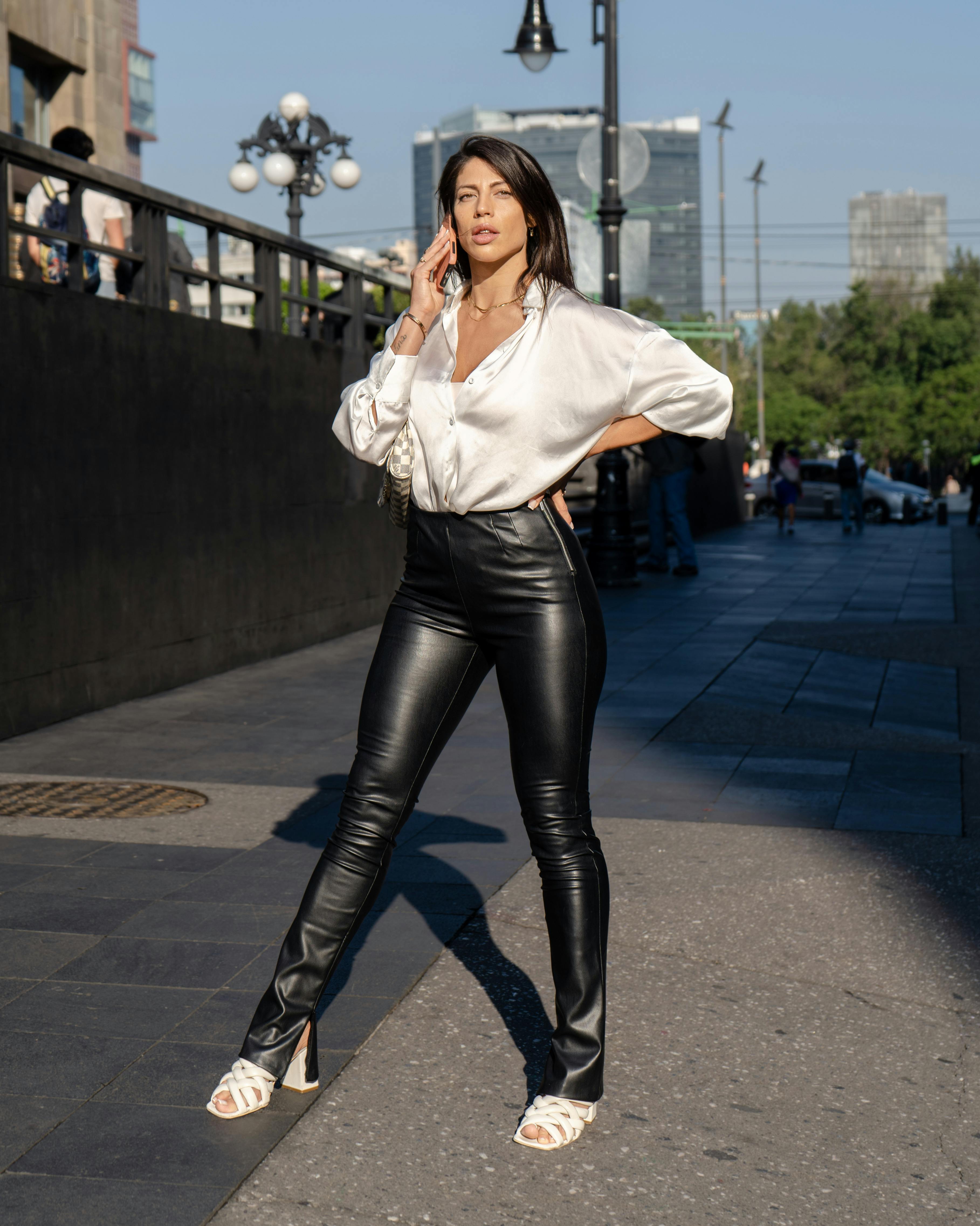 Fashion Girl Wearing Leather Pants and Long Sleeve Stock Image
