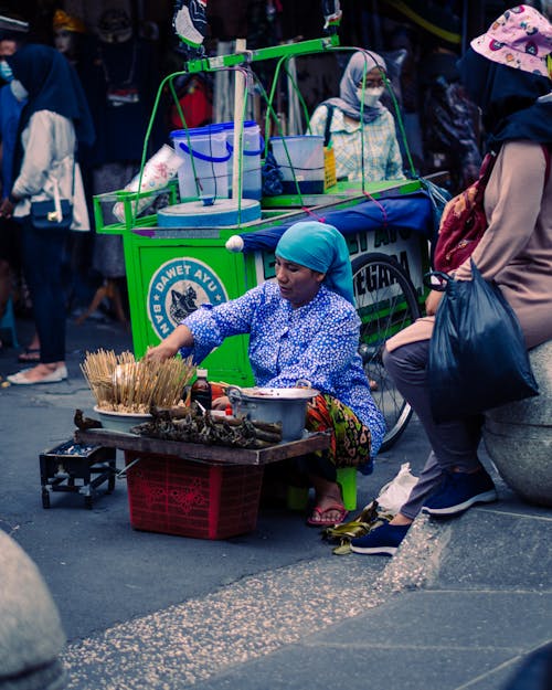 Street Vendor selling Traditional Street Food 