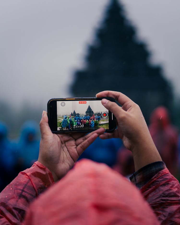 Person Recording A Video On A Smartphone