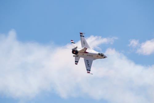 Free White and Red Jet Plane in Mid Air Stock Photo