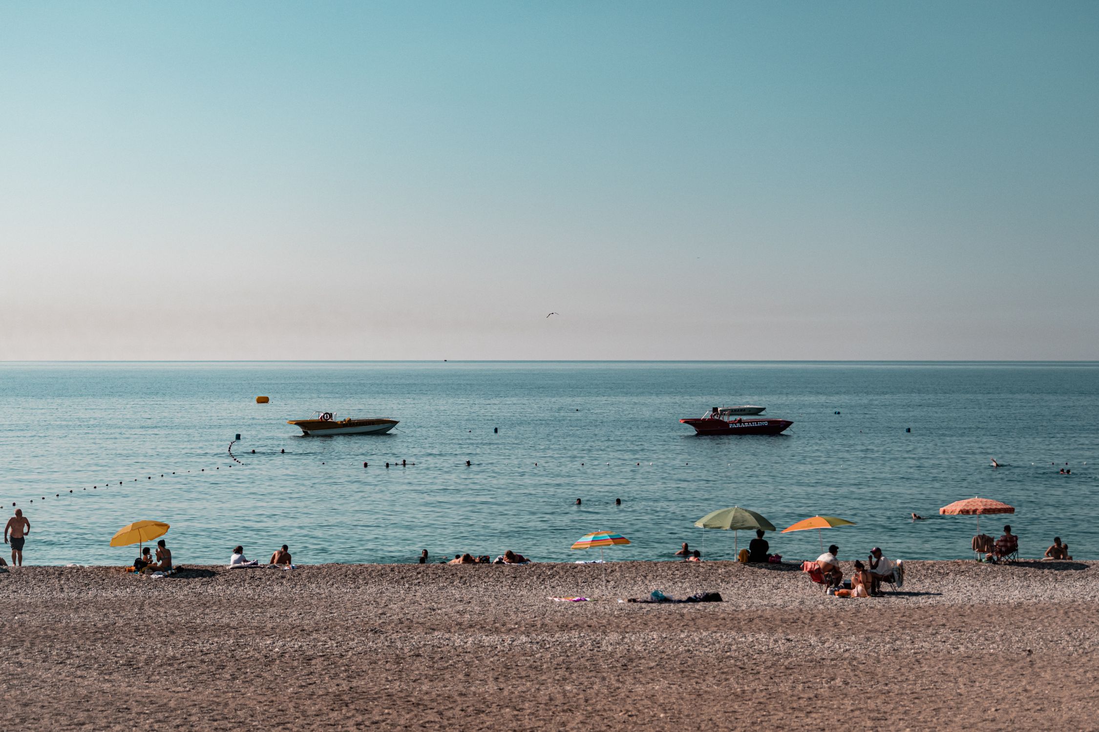 Tourists At Beach Free Stock Photo tourists-at-beach-free-stock-photo