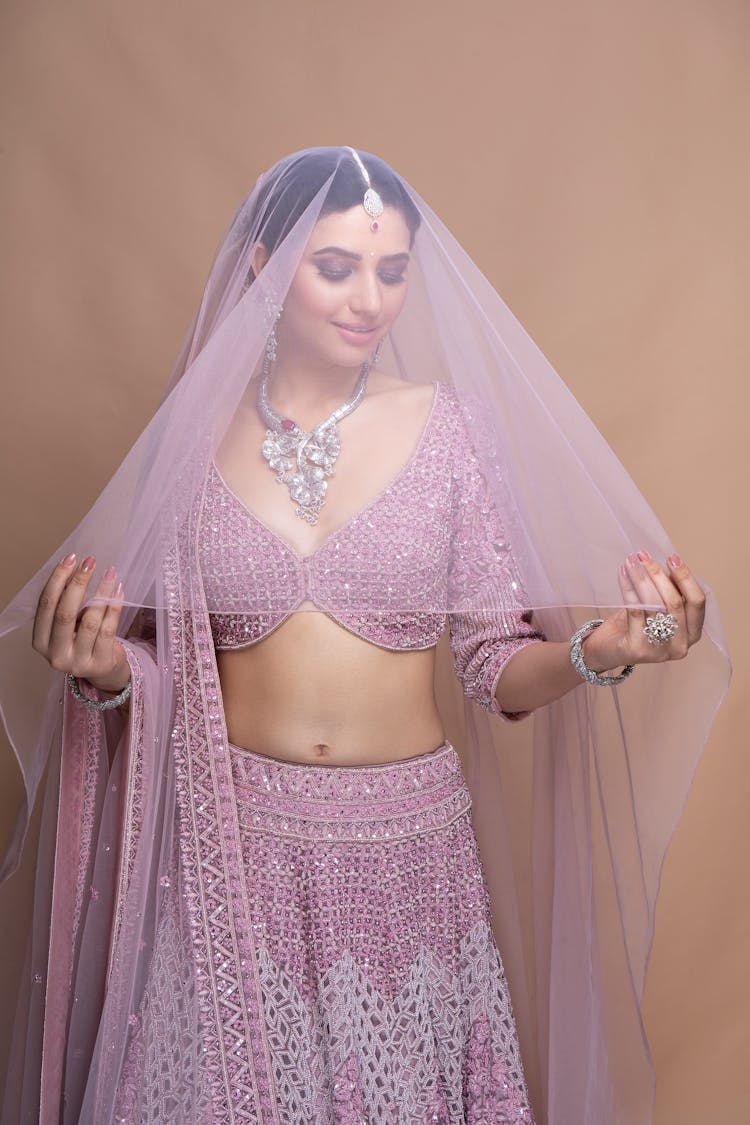 Photo Of A Woman With A Pink Veil