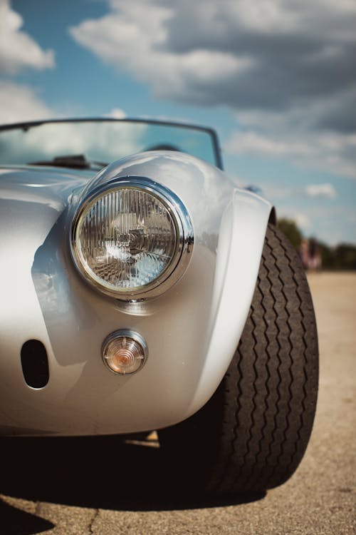 Gray Ac Cobra Car Under the Cloudy Sky 