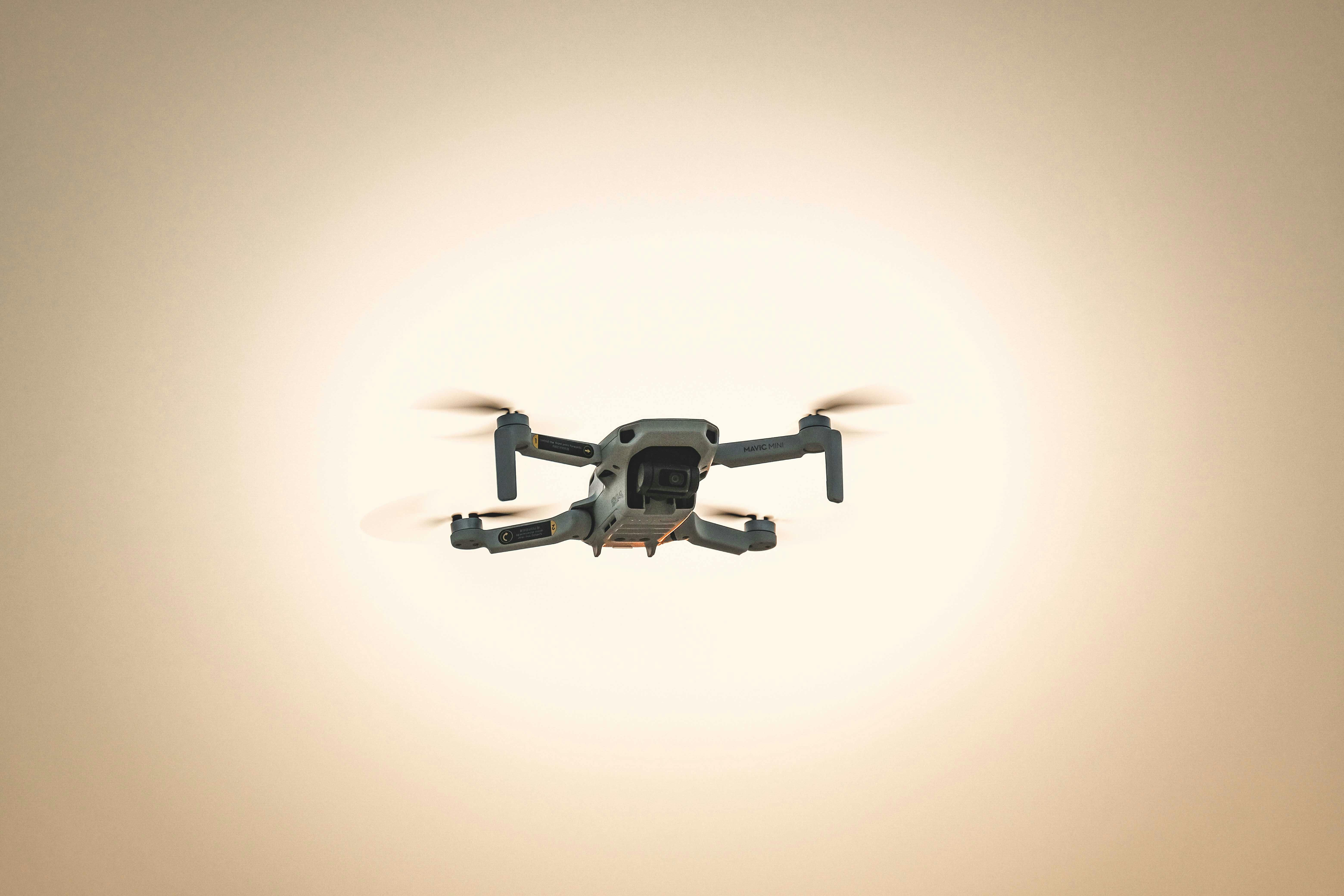 black and gray drone flying