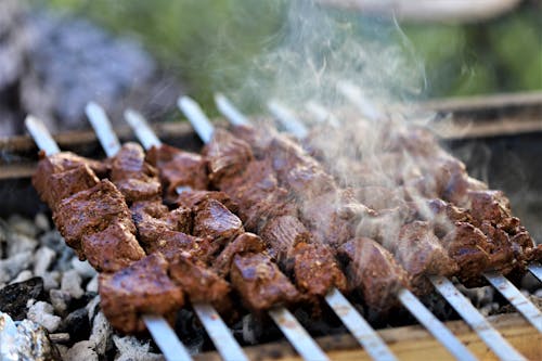 Free Grilling Meat on Skewers Stock Photo