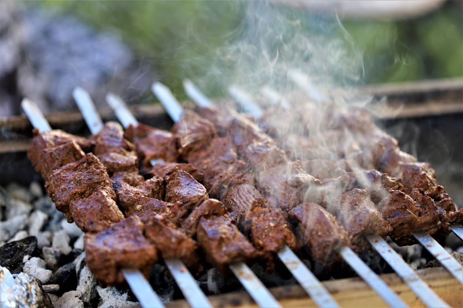 Sizzling Flambe Skewers with aromatic smoke and vibrant spices Sizzling Flambe Skewers with aromatic smoke and vibrant spices