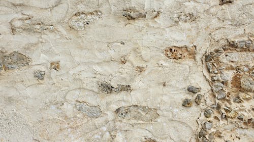 Kostnadsfria Kostnadsfri bild av brun sand, närbild, stenar Stock foto