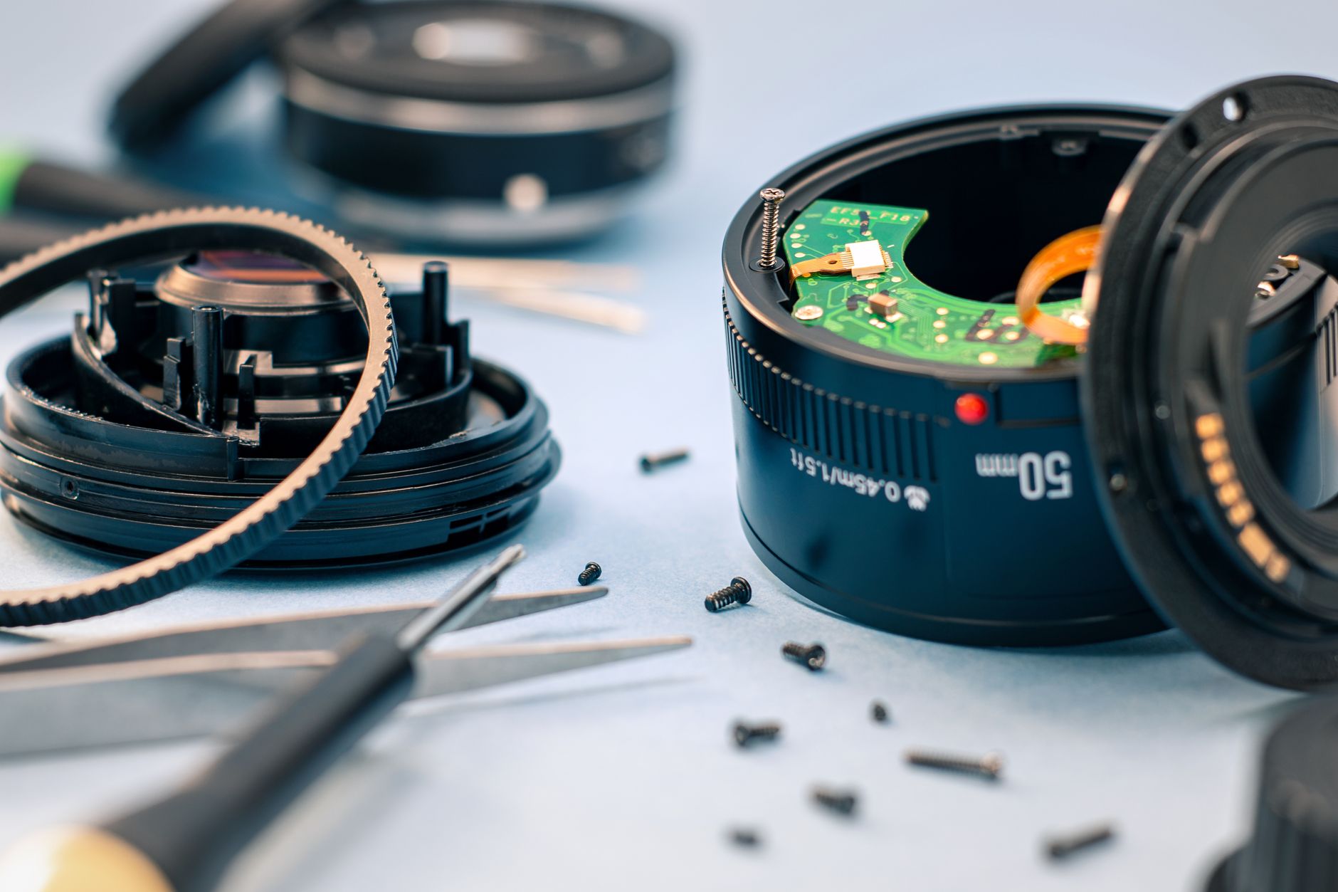 Camera with visible sensor and cleaning tools