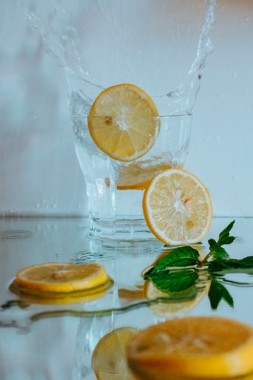Free Sliced Oranges in Clear Drinking Glass Stock Photo