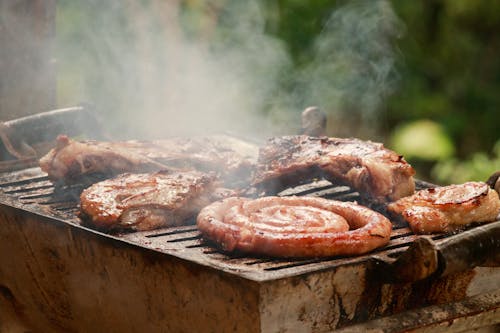 Free Barbecue and Sausage on Grill Stock Photo