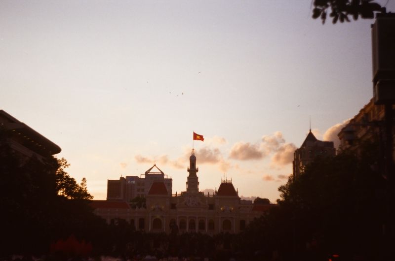 Ho Chi Minh City Hall lit at sunset
