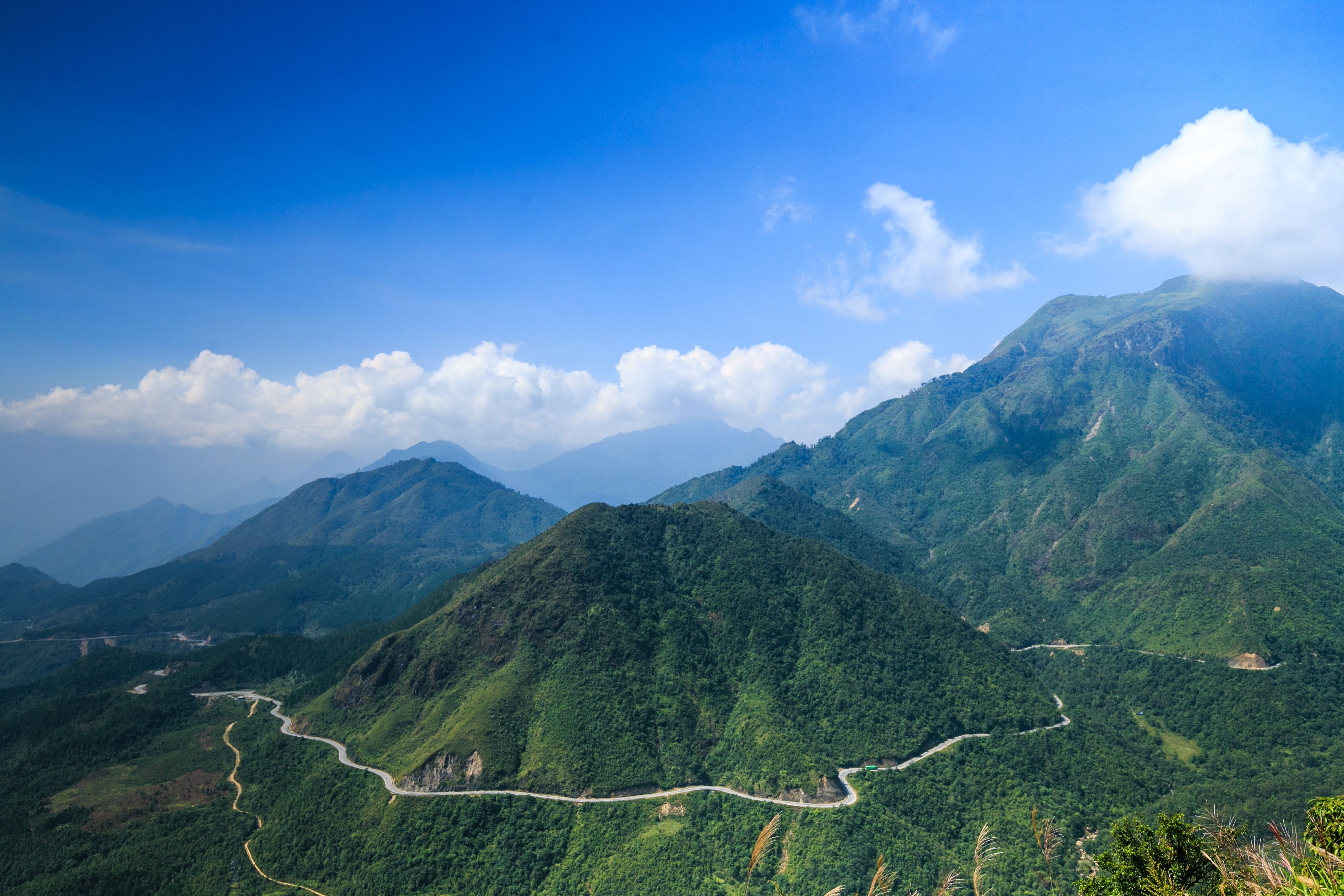 Aerial Photography of Green Mountains under the Cloudy Blue Sky · Free ...