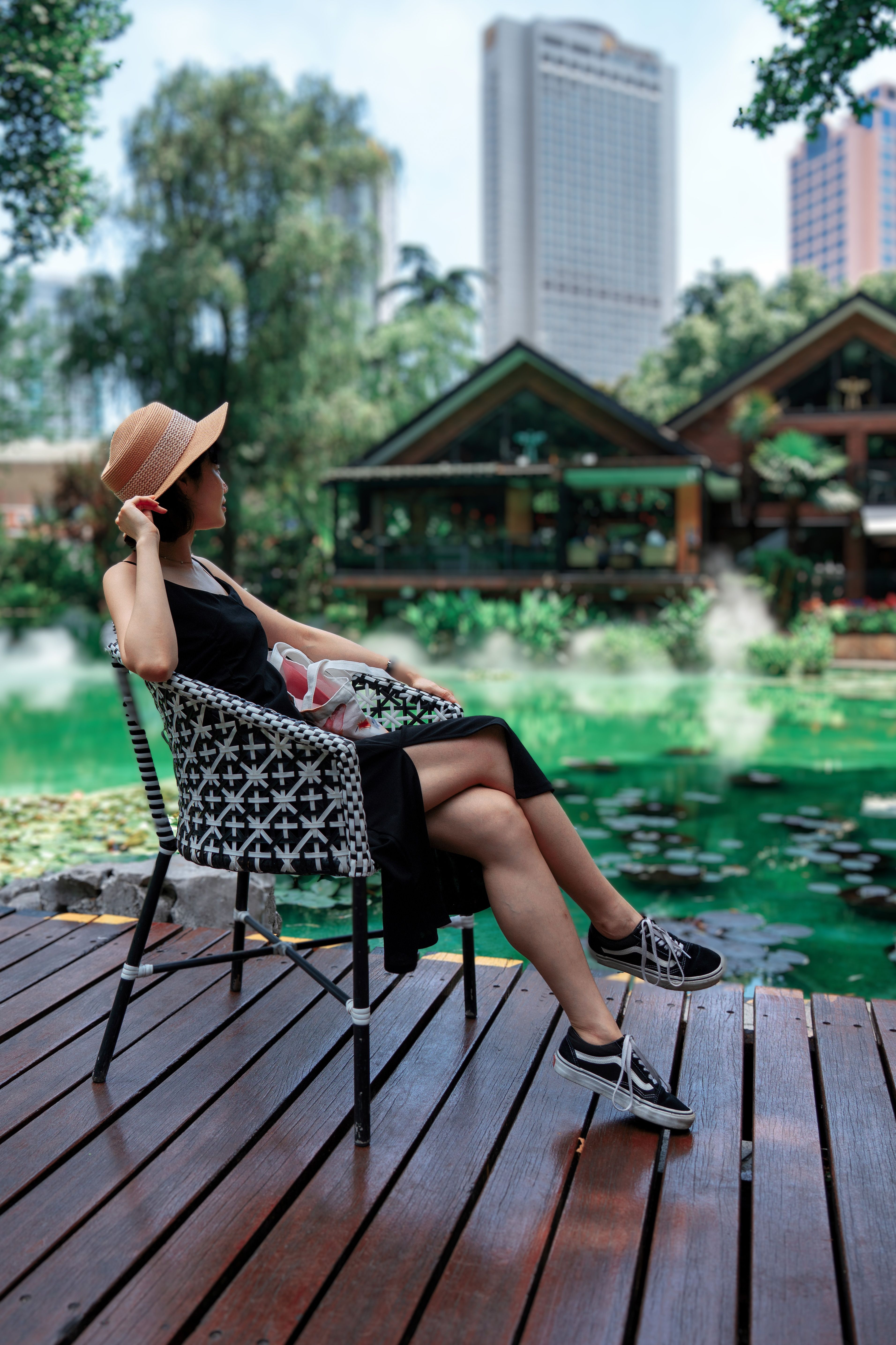 Woman in Black Dress Sitting on a Chair · Free Stock Photo