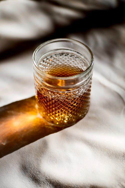 Free Crystal Glass With Alcoholic Drink Stock Photo