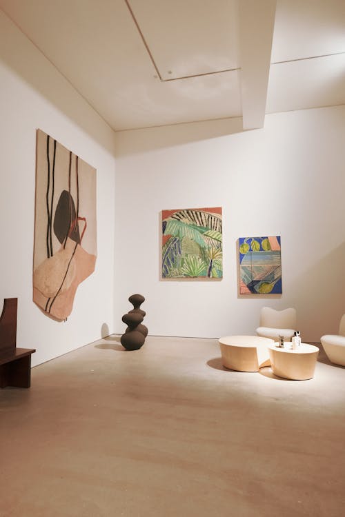 Interior of a Modern, Minimalist Room with Art on the Walls 