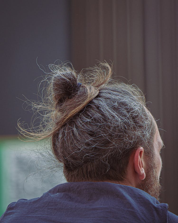 Man Bun Hair Style Of A Person