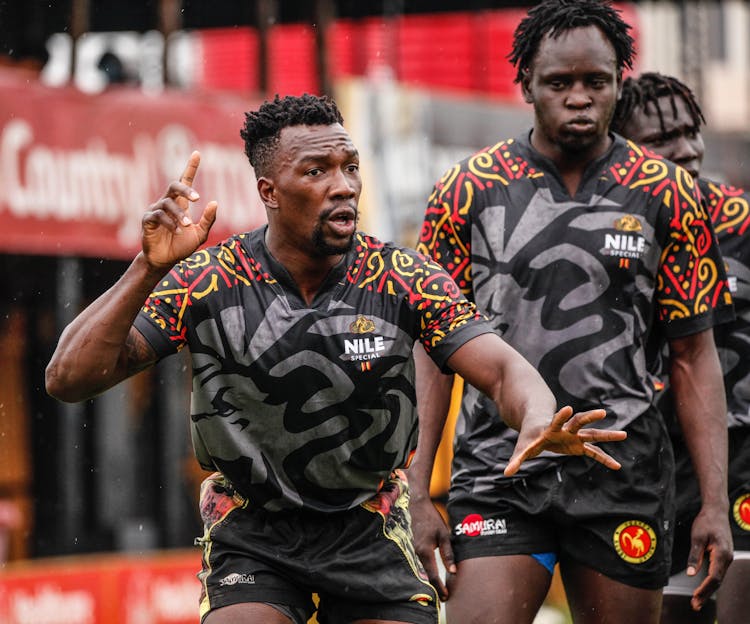 Athletes Wearing Black Uniform