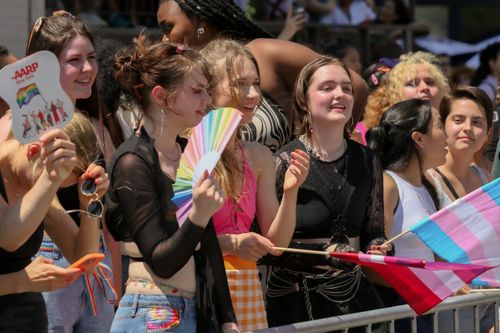 Free Vibrant group of diverse individuals celebrating at a pride parade in New York City during the day. Stock Photo