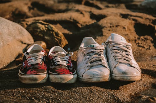 Free Dirty Pairs of Shoes Stock Photo