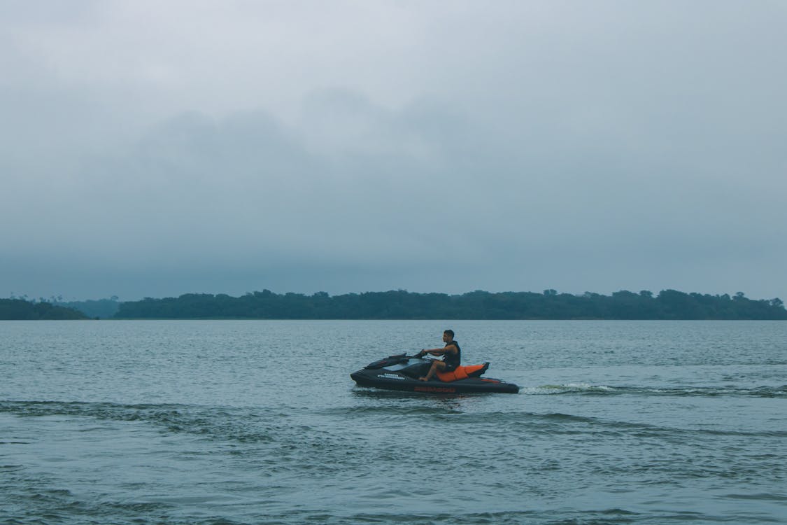 Person Riding a Jet Ski