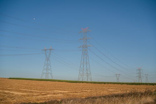 Fotos de stock gratuitas de campo, cielo azul, electricidad