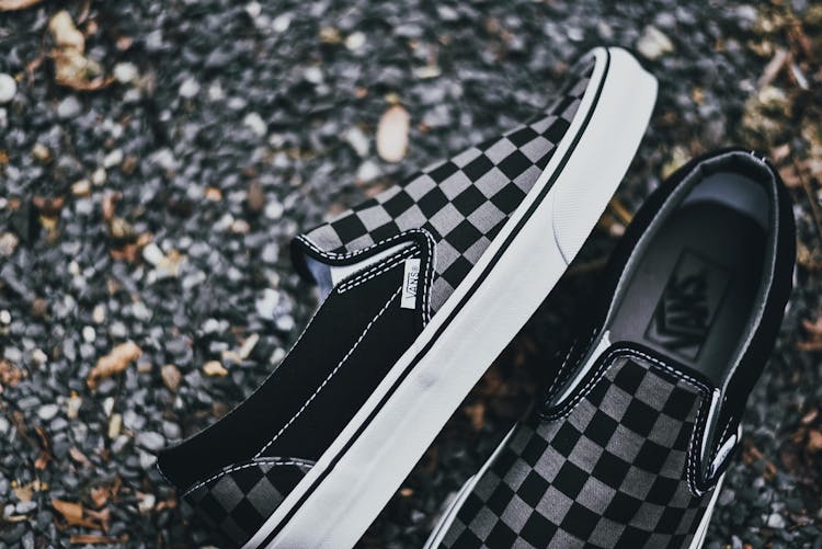 Gray And Black Checkered Slip-on Shoes On Ground