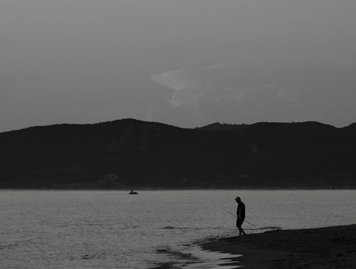 Silhouette of Person at the Beach