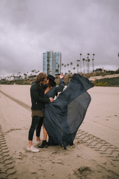 A Couple Kissing on the Beach