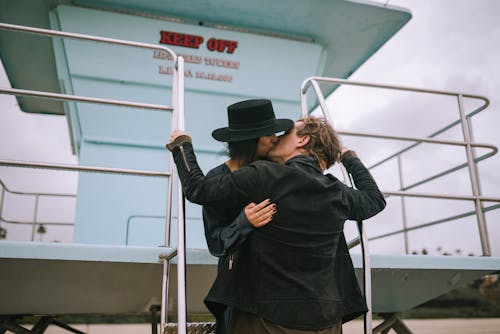 Couple Kissing on Lifeguard Tower